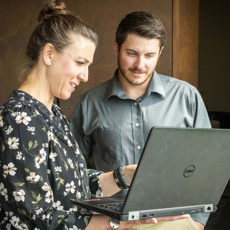 Students Reviewing Content on a Laptop